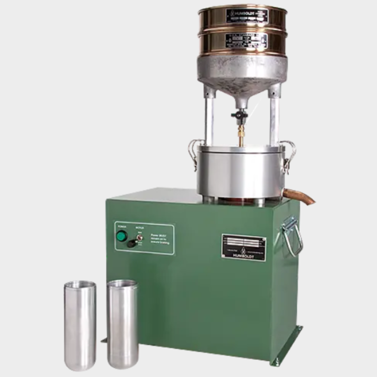 Supports the following standards: ASTM D1856, AASHTO T164  The continuous-flow filterless centrifuge extractor is ideally suited for use in the extraction of mineral fines from bitumen-laden solvents obtained from standard asphalt extraction tests. In operation, the solvent suspension is fed through the top funnel into a special aluminum beaker, (2) H-1857.5 supplied). Using the high, 11,000 rpm centrifugal force, the liquid moves up the beaker wall and out the overflow tube while the solids remain for easy removal at test completion. The system allows the continuous feeding of the suspension until the solids- retaining capacity of the beaker is reached. The unit is supplied complete with a No. 18 (1.0mm) and No. 200 (75_m) sieve for placement at the top of the inlet funnel. Using this arrangement, an asphalt mix extraction test can be carried out by pre-dissolving the mix with solvent and then pouring the sample into the sieve. Dimensions: 20